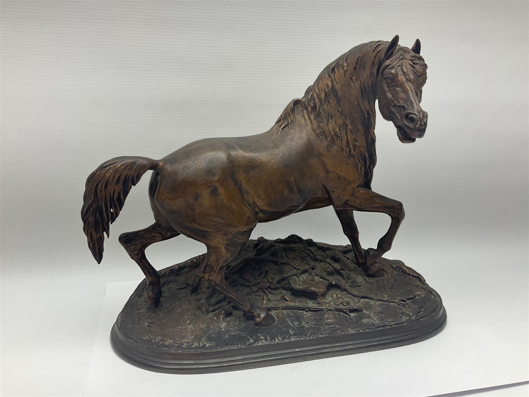 After P J Mene, bronze figure of a horse on a stepped oval base, H31cm 