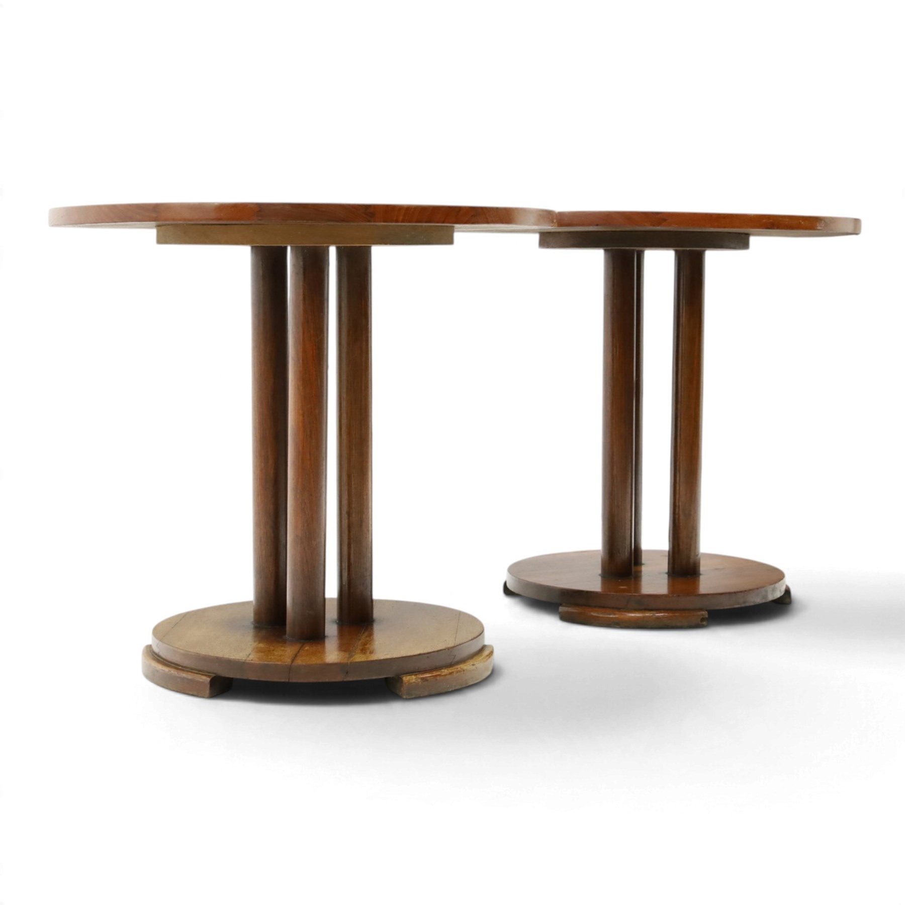 Pair of early 20th century oak lamp tables, circular tops raised on cluster-column pedestals, with circular platform bases and shaped bracket feet (2)
