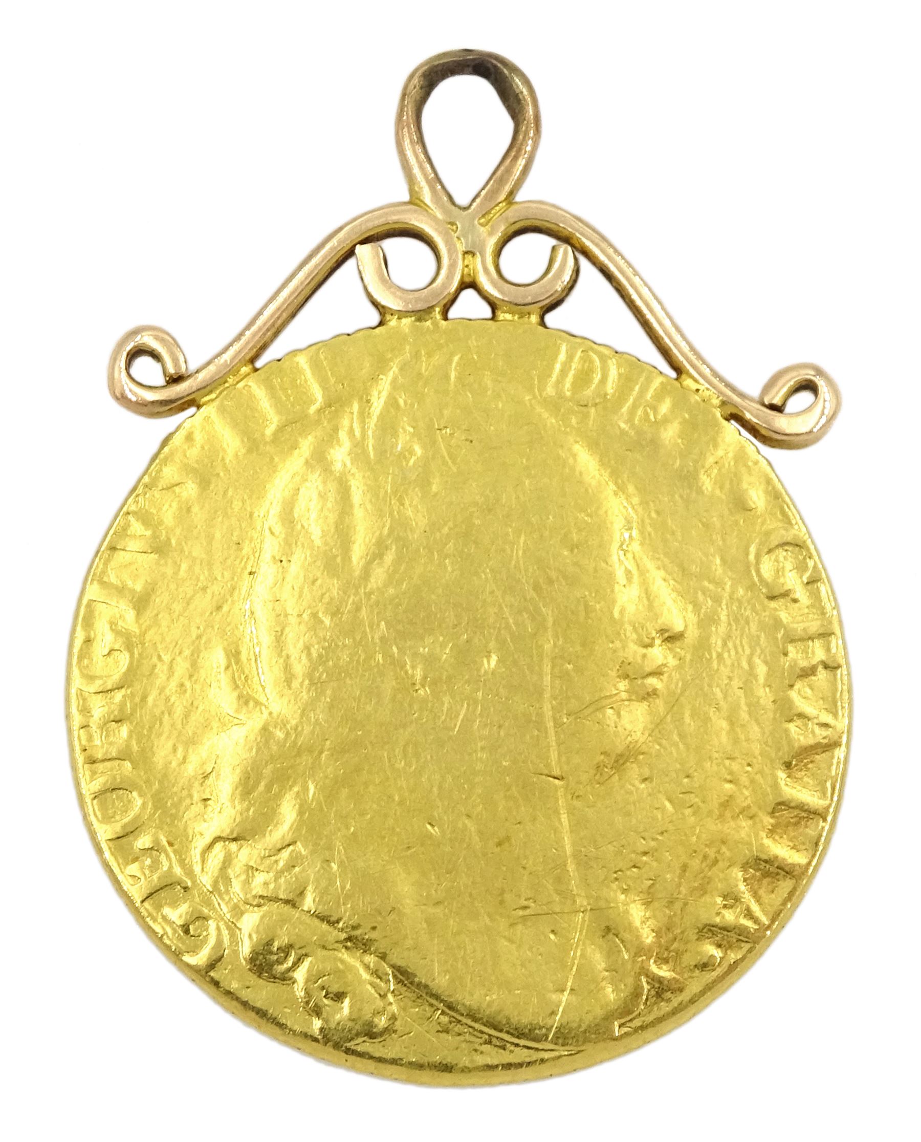 George III gold guinea coin, with soldered gold mount