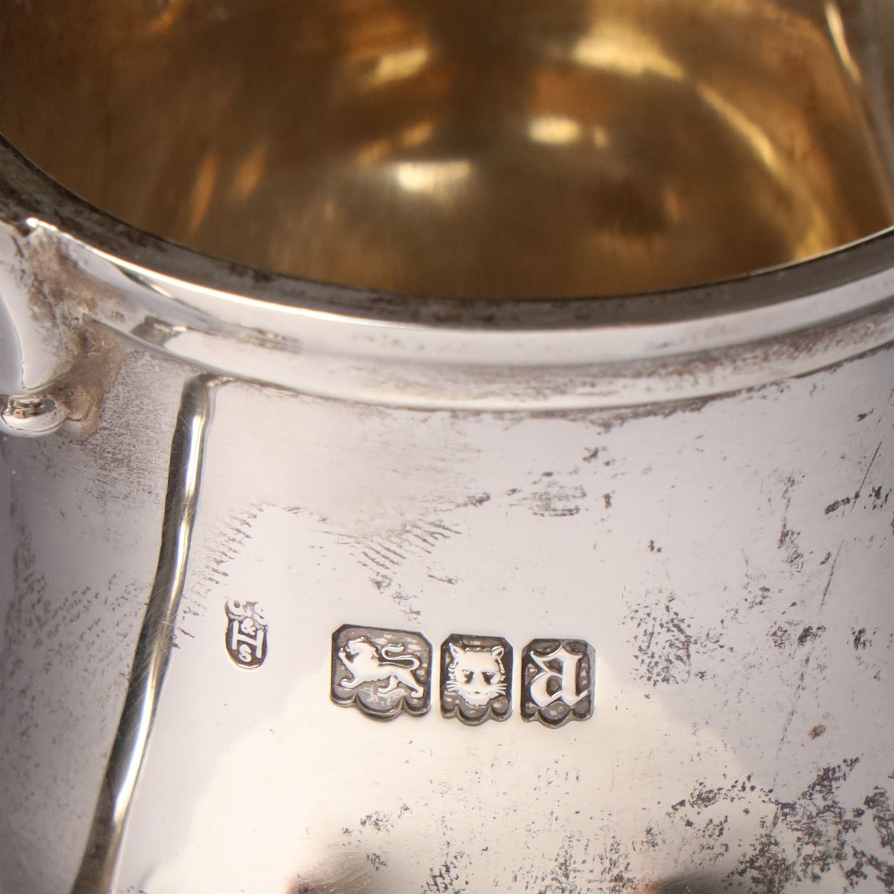 Four piece silver tea and coffee service of baluster form, the tea and coffee pots with domed covers and stained handles London 1916-1918, Maker  C S Harris & Sons Ltd