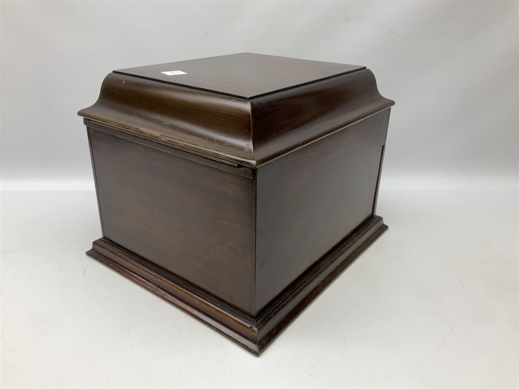 Early 20th century wind up gramophone set in a wooden case with twin door sound hole to the front and tins of 'His Masters Voice' needles