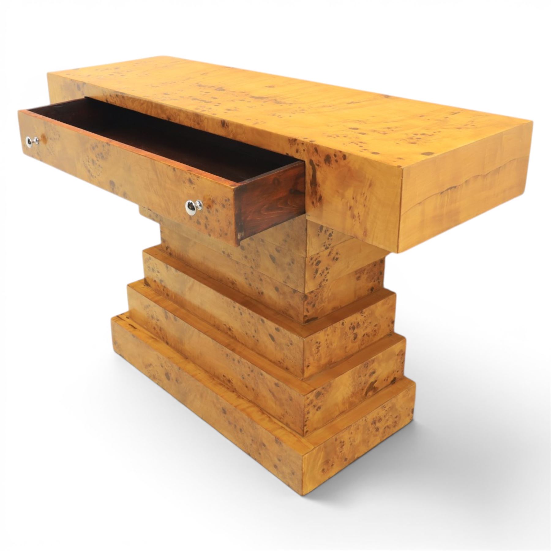 Art Deco style burr walnut console table, rectangular top fitted with a single frieze drawer with chrome pull handles, on stepped pedestal support and plinth base