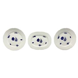 Three 19th century plates, comprising two circular examples and one oblong, each with osier moulded sides, the centres decorated in underglaze blue with Gillyflower type pattern, circular examples D25cm oblong example W27cm