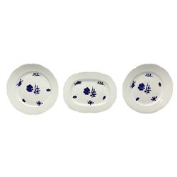 Three 19th century plates, comprising two circular examples and one oblong, each with osier moulded sides, the centres decorated in underglaze blue with Gillyflower type pattern, circular examples D25cm oblong example W27cm