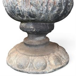 Impressive pair of early highly decorative lead garden urns, griffin handles with ornate decoration depicting cherubs and laurel wreath