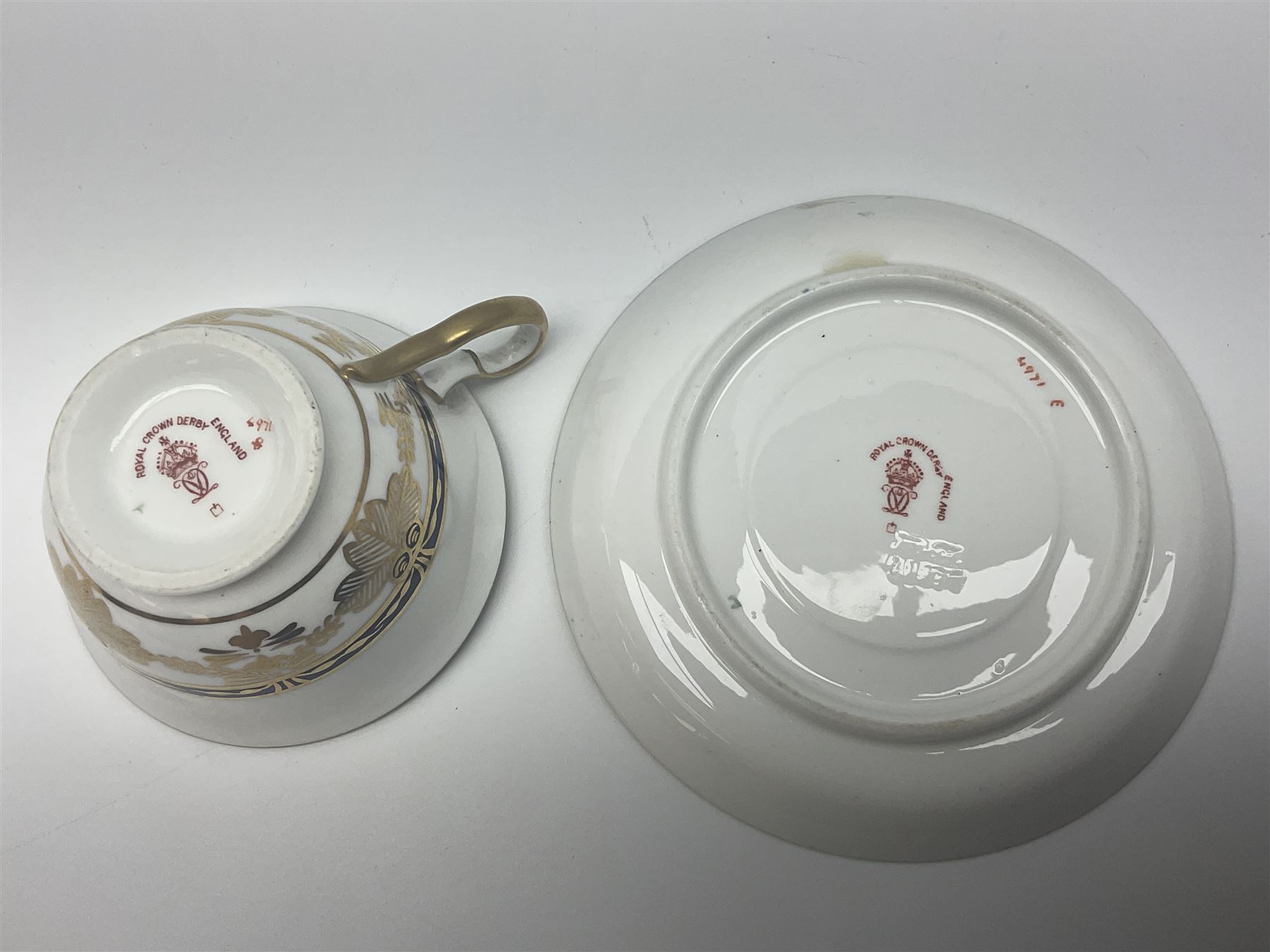 Royal Crown Derby Imari pattern 4971, cup and saucer, circa 1913, together with Royal Crown Derby Imari pattern 1128, trinket dish, circa 1978, both with printed mark beneath 