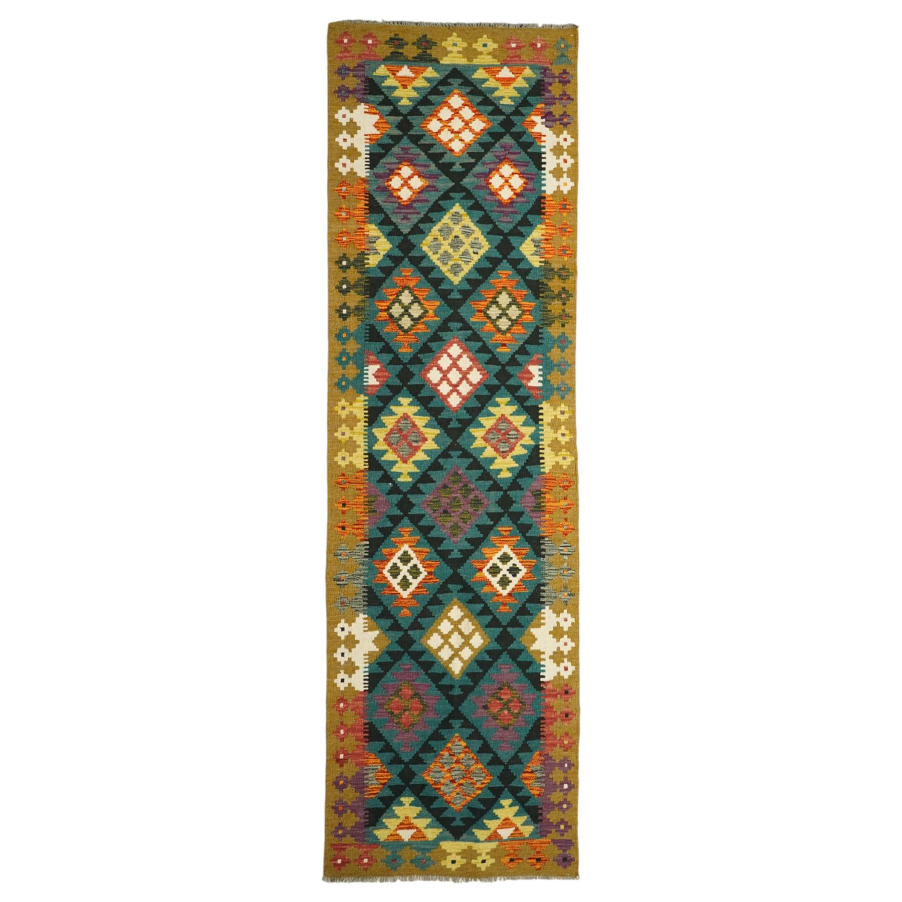 Maiman kilim, woven with an arrangement of multicoloured diamonds on a dark ground with contrasting ivory and ochre highlights, enclosed by a broad border featuring alternating geometric devices in green, mustard, red and blue