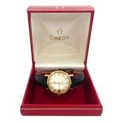 Omega Seamaster De Ville gentleman's 18ct gold automatic wristwatch, Ref. 166.5020, Cal. 562, silvered dial with baton hour markers and date aperture, Birmingham 1962, on Omega black leather strap, with gilt buckle, boxed