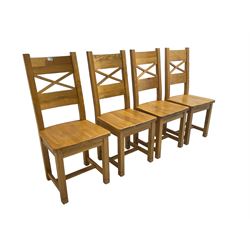 Set four oak dining chairs with x-frame back