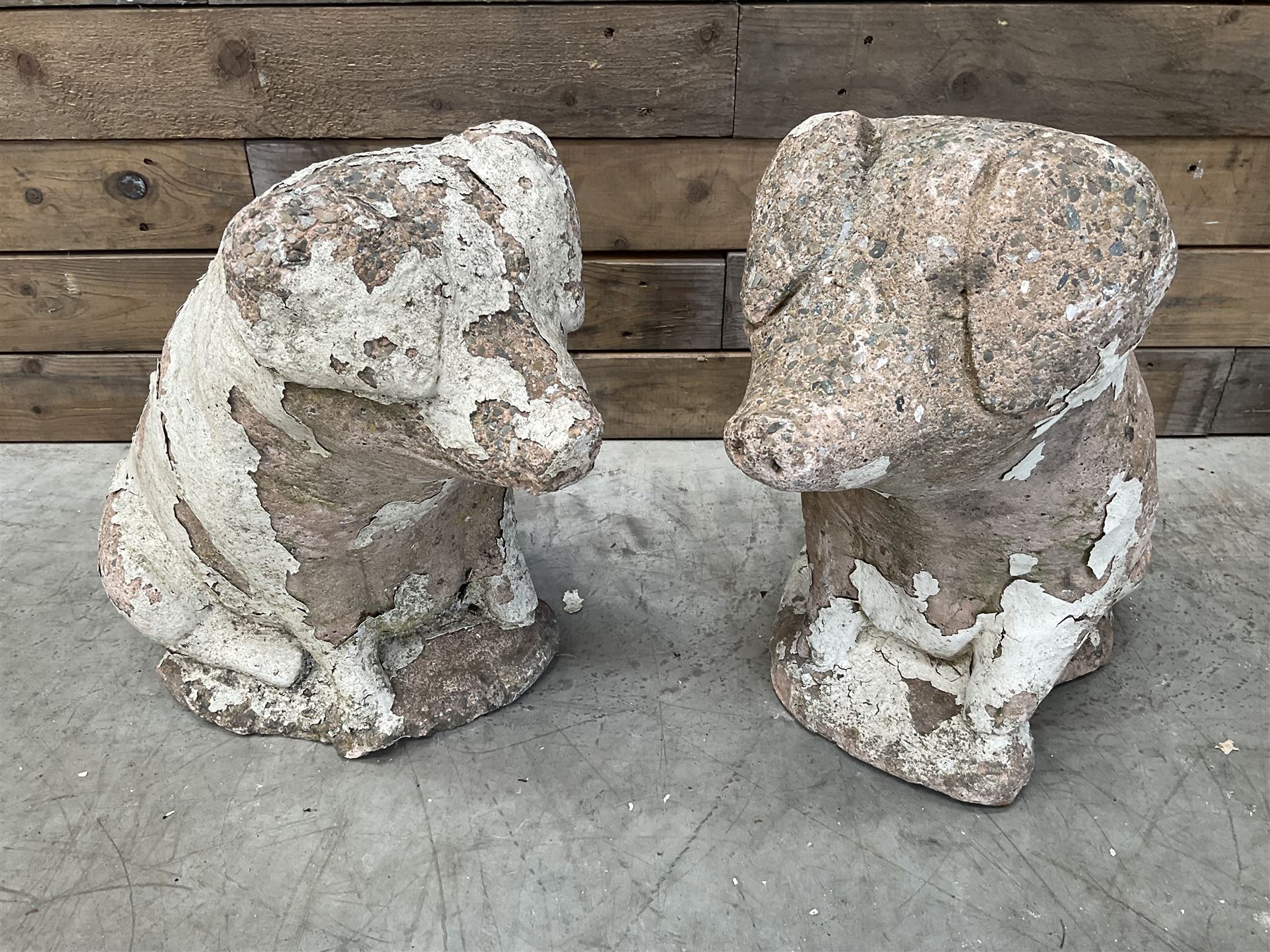 Pair painted stone pigs 