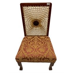 Early 20th century walnut framed bedroom chair, bergere cane back with centre motif, upholstered seat