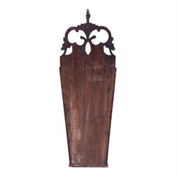 Three George III and later oak candle boxes, the first example of tapering form with shaped and pierced scroll crest, above a hinged lid, H50.5cm W18cm D13cm, the second of plain rectangular form with tapering crest, above a studded leather hinged sloped lid, H46cm W15.5cm D15.5cm, and third of plain rectangular form with demi-lune crest, with lift up front, H42.5cm W17.5cm D12cm 
