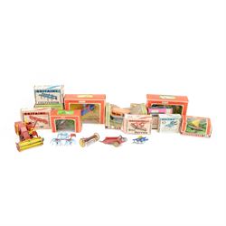 Britains 1:32 scale farm implements, vehicles and figures,  comprising 9563 Hay Baler, 9539 Seed Drill, 9534 Disc Harrow, 9537 Acrobat Rake, 9530 Three Furrow Plough, 9547 Horse Box with Horse, 9576 Farm Land Rover, 2078 male Rider with Horse, 9533 Roller, 9538 Vari-Spreader, 9536 Cultivator, three 1742 Hay Bales, 1740 Milk Churns and 1741 Sacks, all boxed, together with trees, walls, buildings and loose vehicles