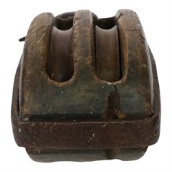 19th century double-sheave wooden pulley block in a metal casing, fitted with an iron hook, stamped GIS to one side, including hook L36cm
