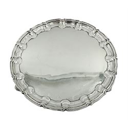 Edwardian silver salver, of circular form with Chippendale type rim, upon three scroll feet, hallmarked William Hutton & Sons Ltd, London 1904, D21cm, approximate weight 14.11 ozt (439 grams)