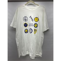 Fourteen items of replica sporting clothing including Leeds United football club shirts, England jerseys etc