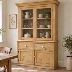 Victorian stripped pine and glazed dresser, projecting ovolo cornice over glazed doors enc...