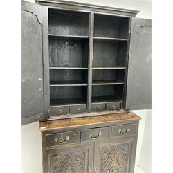 18th century and later oak side cabinet, three drawers above two carved panel doors (W94cm, H106cm, D49cm) and an 18th century oak two door cupboard with mahogany pilasters (W92cm, H97cm, D34cm)
