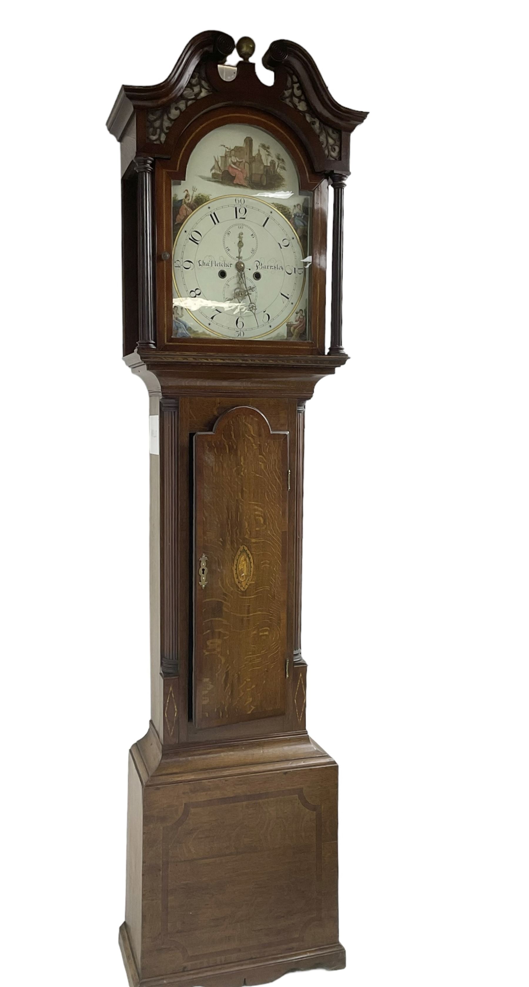 Charles Fletcher of Barnsley - Oak and Mahogany 8-day longcase clock, c 1830, with a swans neck pediment, silk backed open fret work beneath and a break arch hood door, flanked by reeded pilasters with wooden capitals, trunk with reeded quarter columns and a break arch topped door, plinth with inlaid banding on a shaped base, painted dial with Arabic numerals, seconds and date dials, stamped brass hands and painted depictions of the four seasons to the spandrels, dial pinned via a false plate to a rack striking movement with a recoil anchor escapement, striking the hours on a cast bell. With weights and pendulum.
