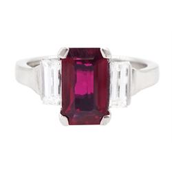 18ct white gold ruby and diamond three stone ring, single emerald cut Thai ruby of approx ...