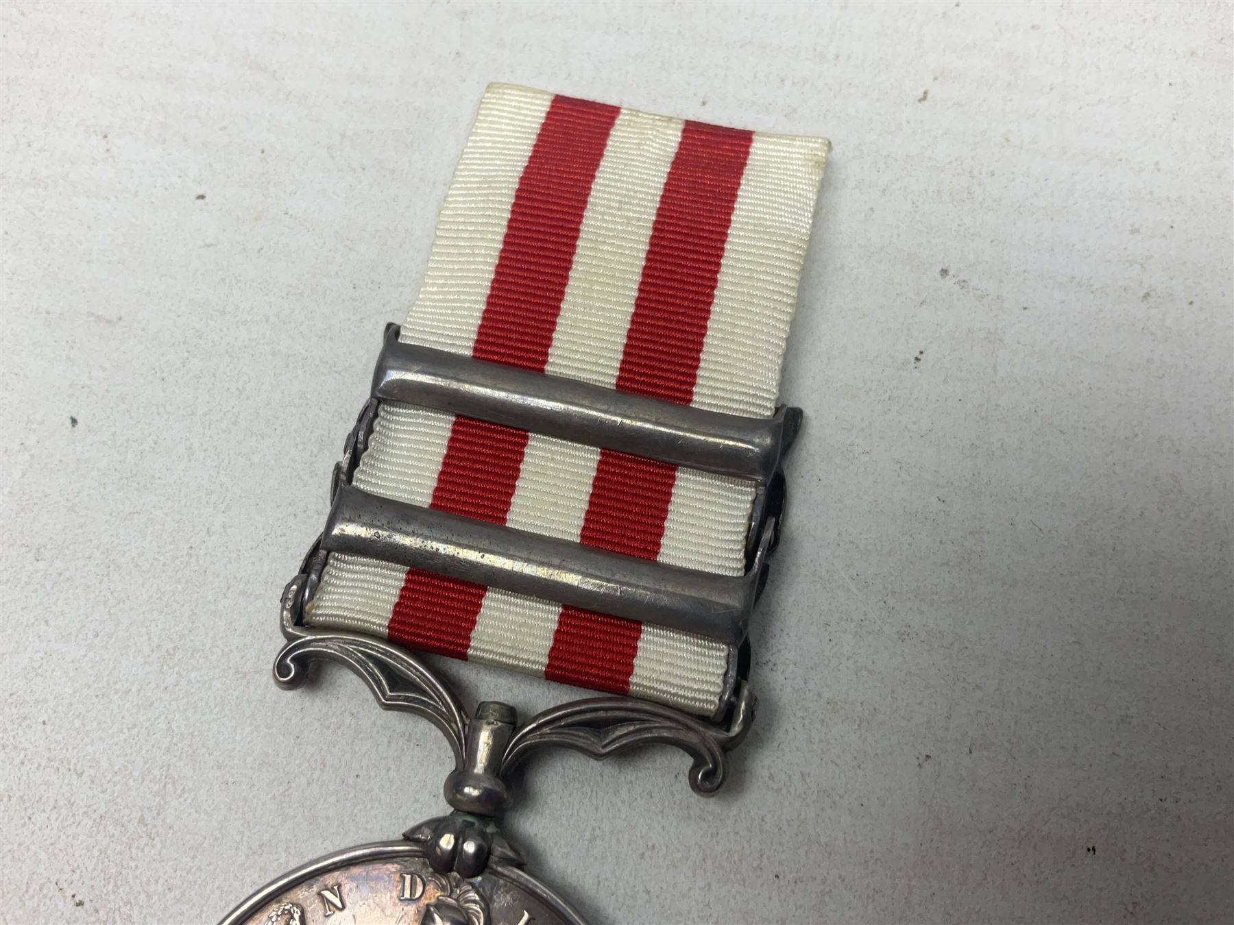 Victoria Indian Mutiny Medal with two clasps for Lucknow and Defence of Lucknow awarded to J. French 1st Batn. 5th Fusrs., with ribbon; some biographical details
