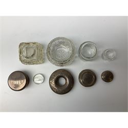 Hallmarked silver top dressing table jars, to include cut glass hobnail example with foliate engraved lid, another 20th century cut glass example with silver engraved screw thread lid, stamped H.S.M Herbert Scott Murdoch, with interior stopper and two smaller glass jars (4)