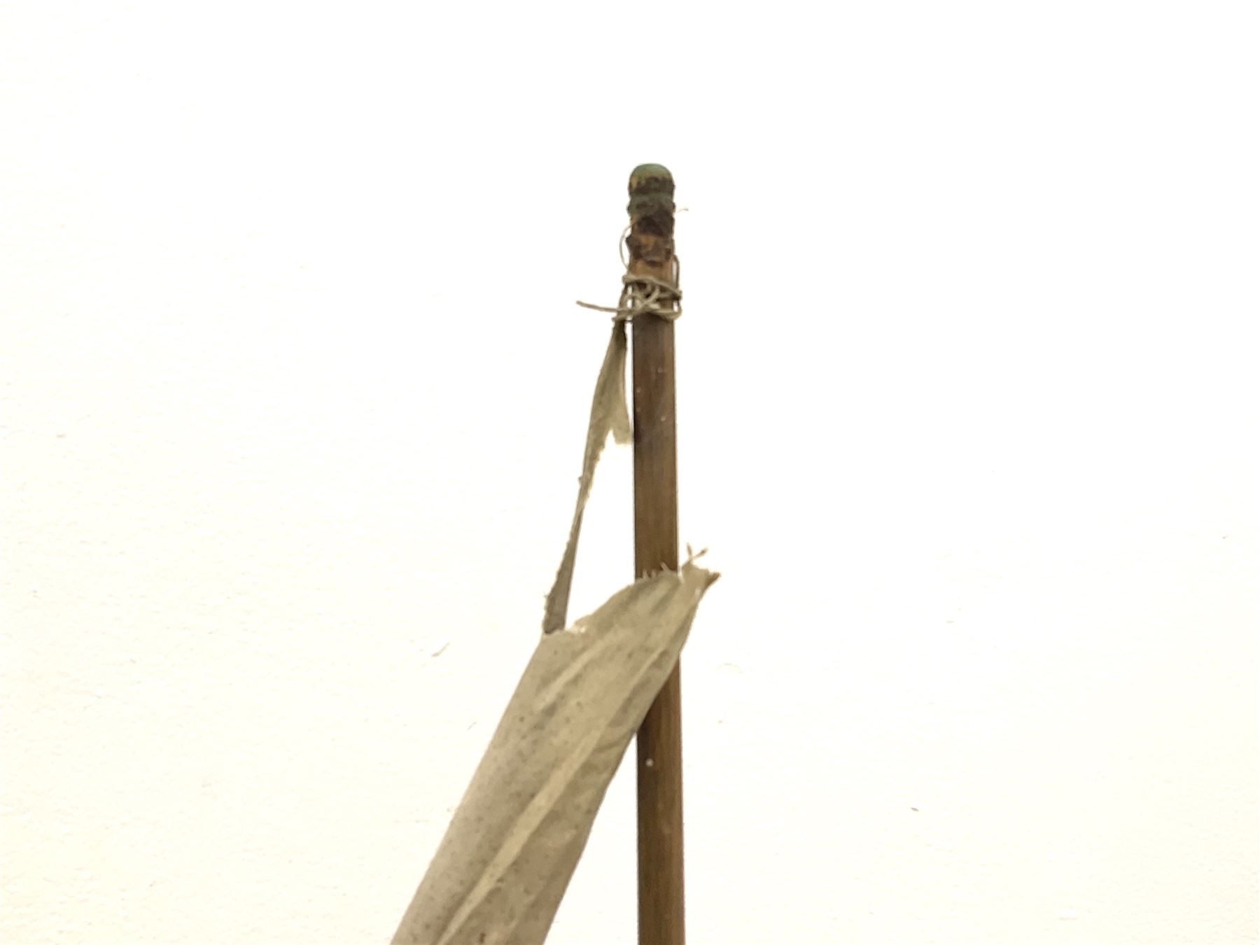 Large Victorian pond yacht, the planked hardwood hull with large lead weighted keel and working rudder, simulated planked deck and single mast with original sails; on later scratch-built wooden stand L117cm H151cm