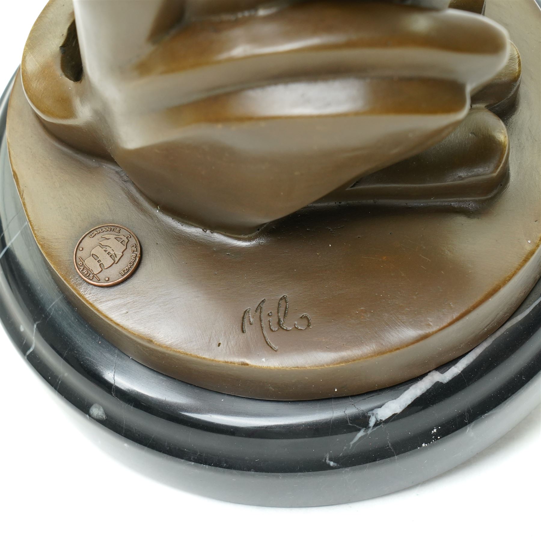 After Milo - bronze model of an art deco style seated cheetah, bearing signature and foundry mark, H32cm