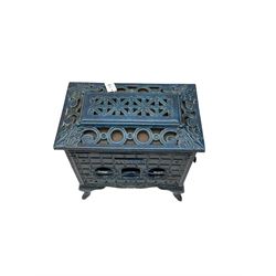 Poeles Nanquette - Art Deco 'Phebus' French enamel wood burning stove, indigo colour with pierced scrollwork decoration and acanthus leaves, on cabriole supports