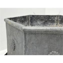 Lead jardinière planter of hexagonal form, each side decorated with stylised flower head motif