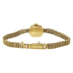 Uno ladies 9ct gold manual wind wristwatch, silvered dial with baton hour markers, on integral 9ct bracelet, hallmarked
