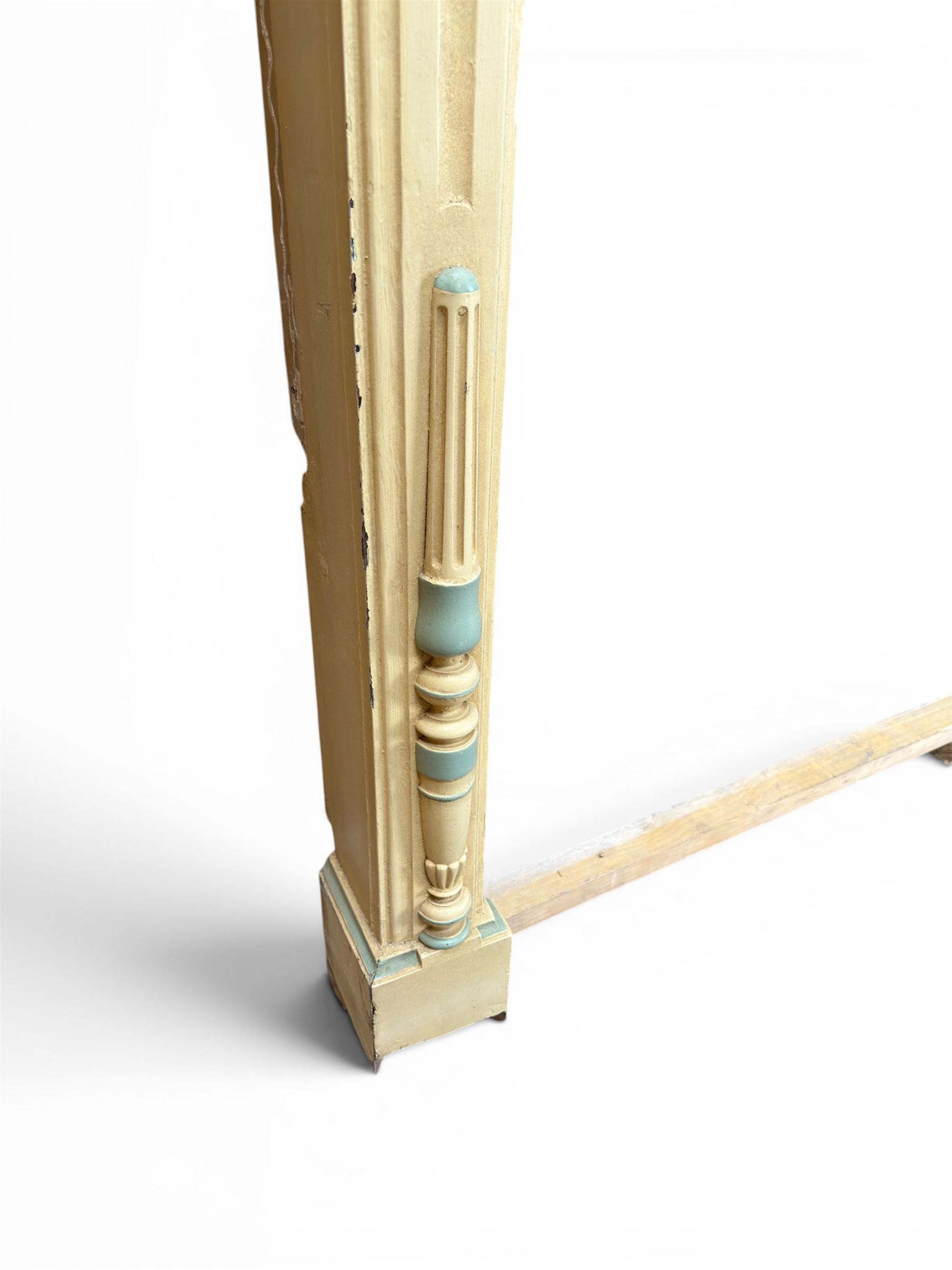 Two large painted pine window or door surrounds, square cornice with arch top, applied mouldings (widths 180cm and 130cm)