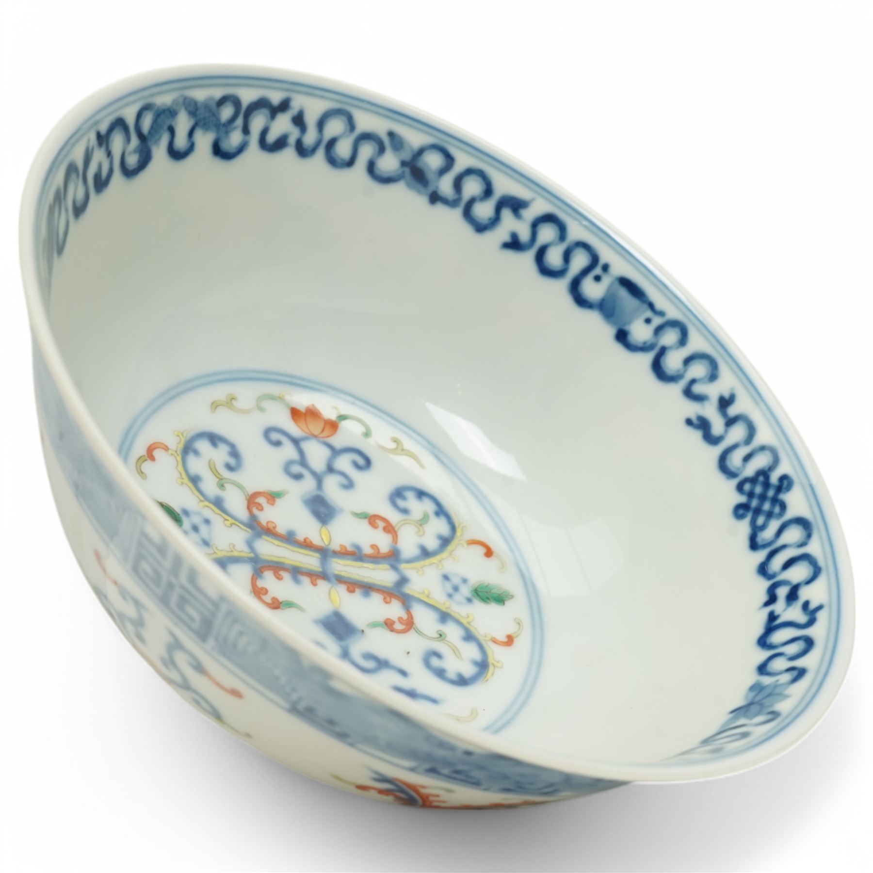 19th century Chinese  Doucai porcelain bowl decorated in blue, orange etc, the interior with a double scroll panel, six character Tongshi reign mark D15cm