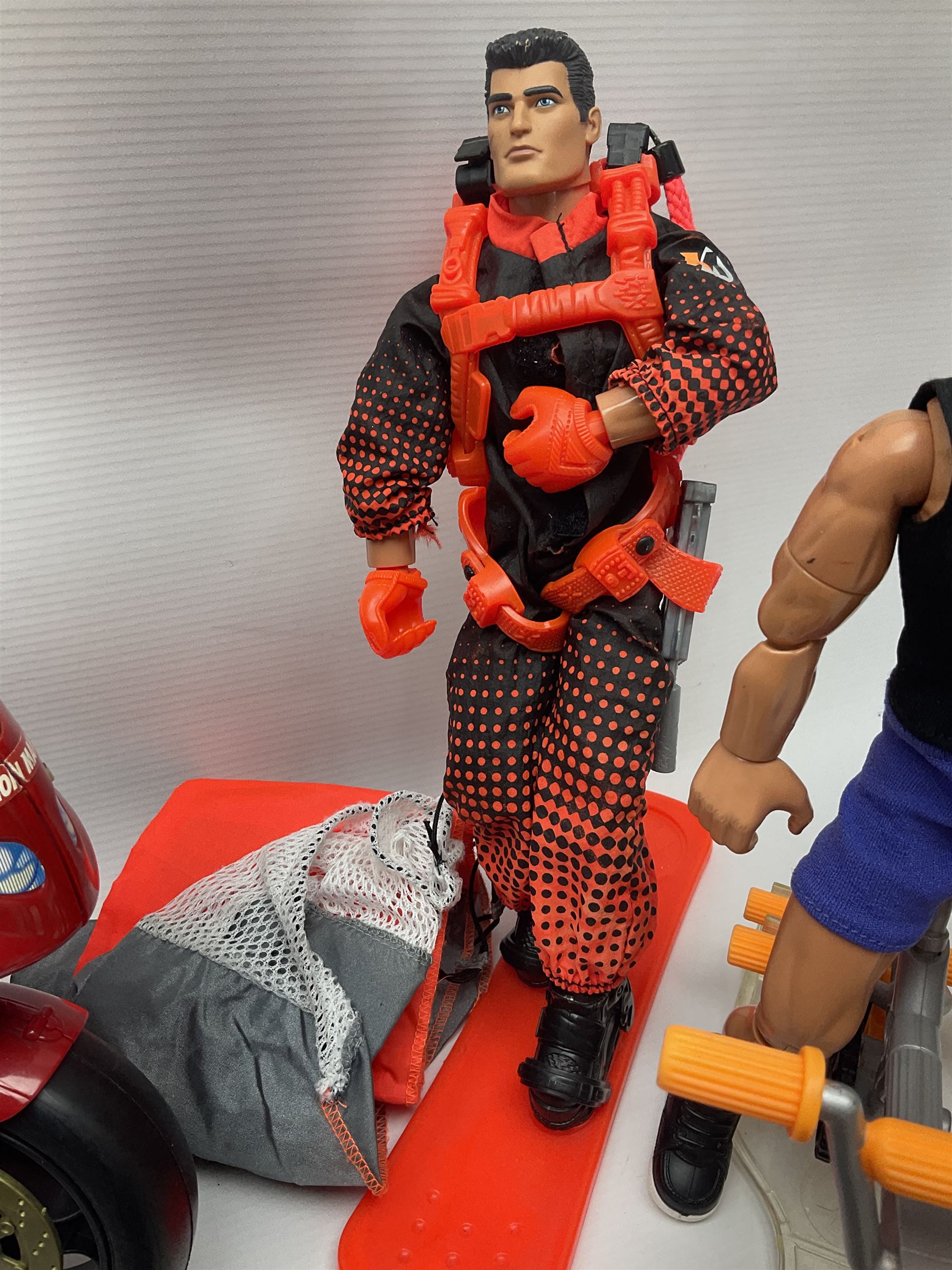 Action Man - six modern figures with associated vehicles/accessories comprising Mission Grand Prix car, motorbike with sidecar, go-kart, motorbike, snowboard and bicycle 