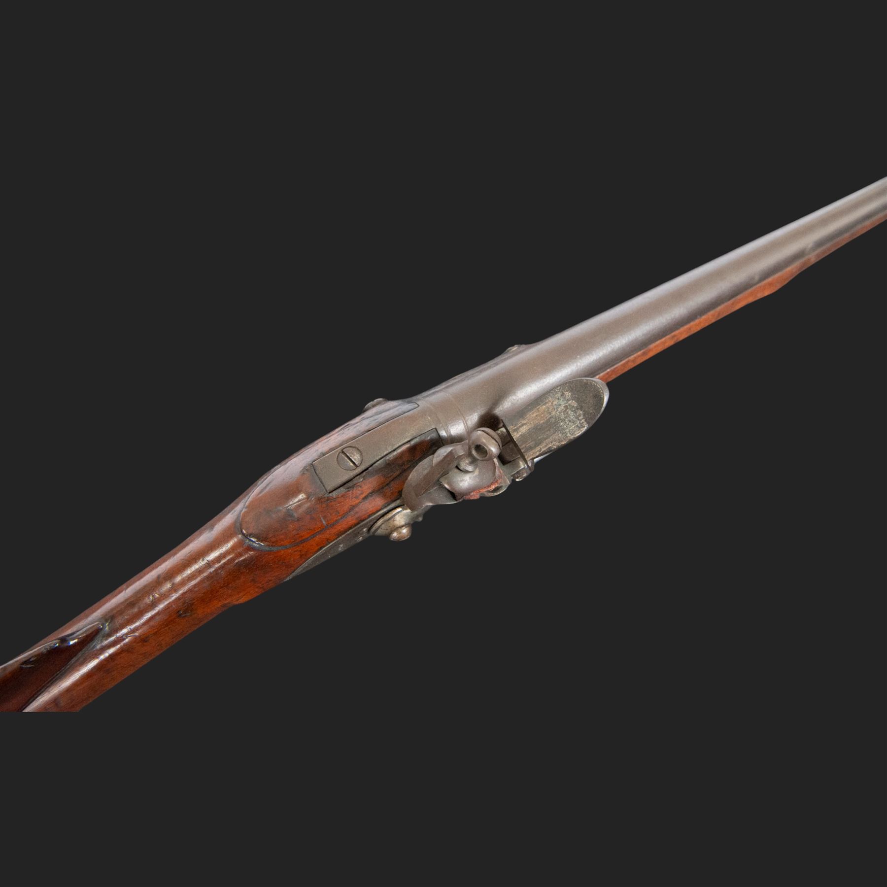 Brown Bess flintlock musket, 37in barrel, action marked with crowned GR and Tower, with brass mounts, the thinned butt marked 38, sling swivels, steel ramrod, overall L132cm
