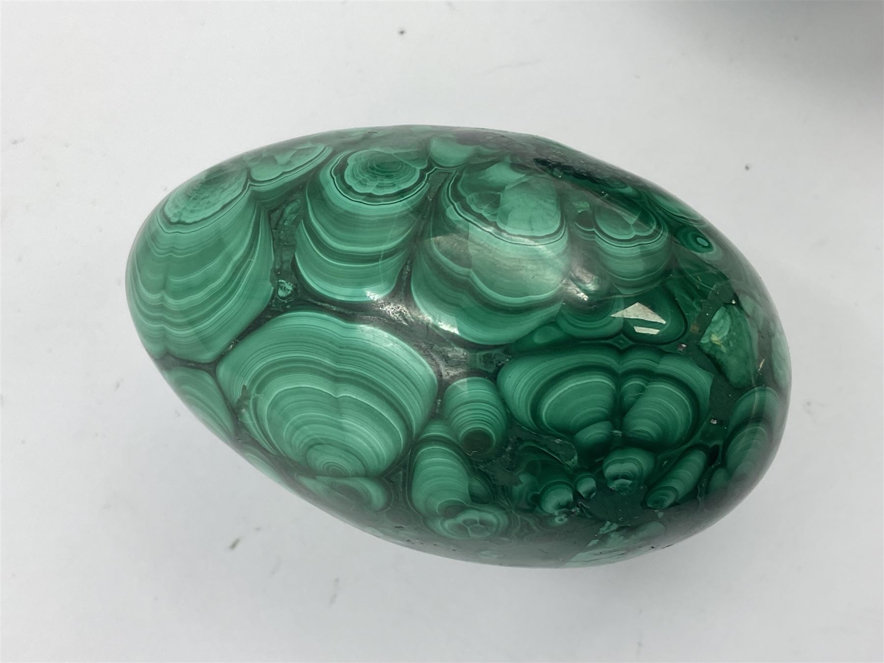 Three malicate specimen eggs, originally part of the collection of the late Stanley J Seeger, largest H7cm