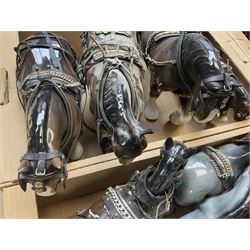 Approximately forty seven ceramic Shire horses to include Sylvac and Melba Ware examples of various sizes and colours, many with harnesses, and a quantity of carts and wagons 