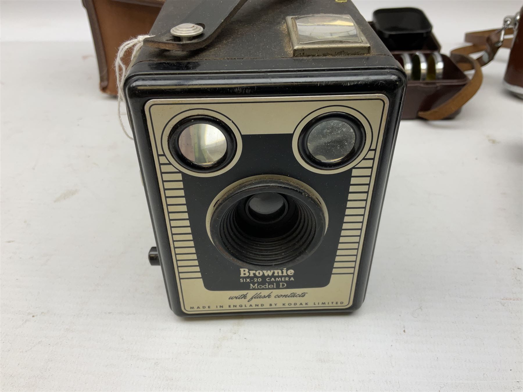 Kodak Retina III camera with 'Schneider-Kreuznach 3977724 Retina-Xenon C f:2/50mm' lens in leather case, and Brownie Model D in leather case