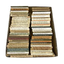 Sixty-six Beatrix Potter Peter Rabbit books - 1930s to 1990s, some with dustjackets and some duplications, including eight ex-library copies