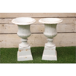  Pair Victorian style white finish cast iron urns on plinths D29cm, H50cm  