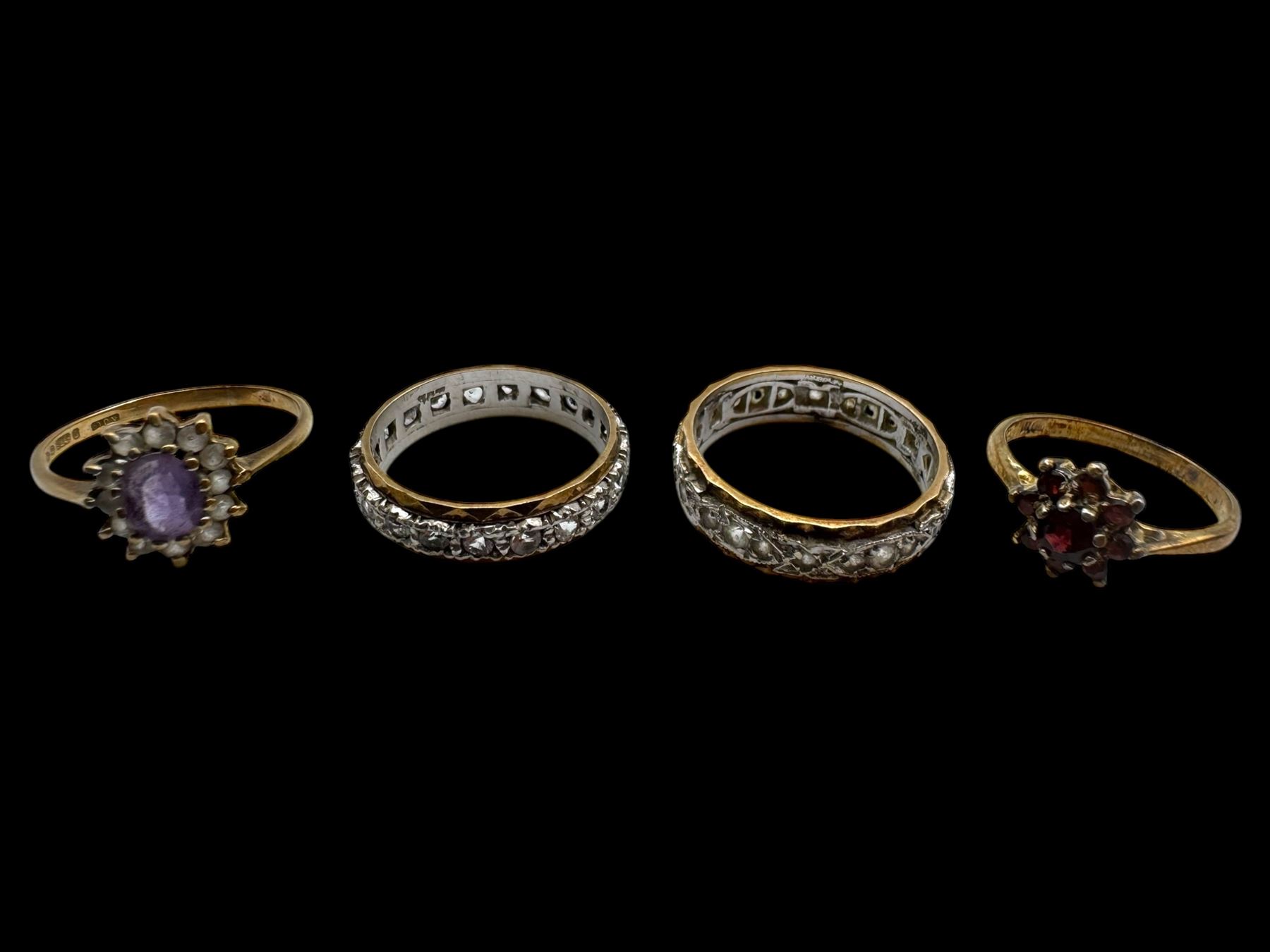 Two gold paste stone set full eternity rings and two gold cluster rings, all 9ct