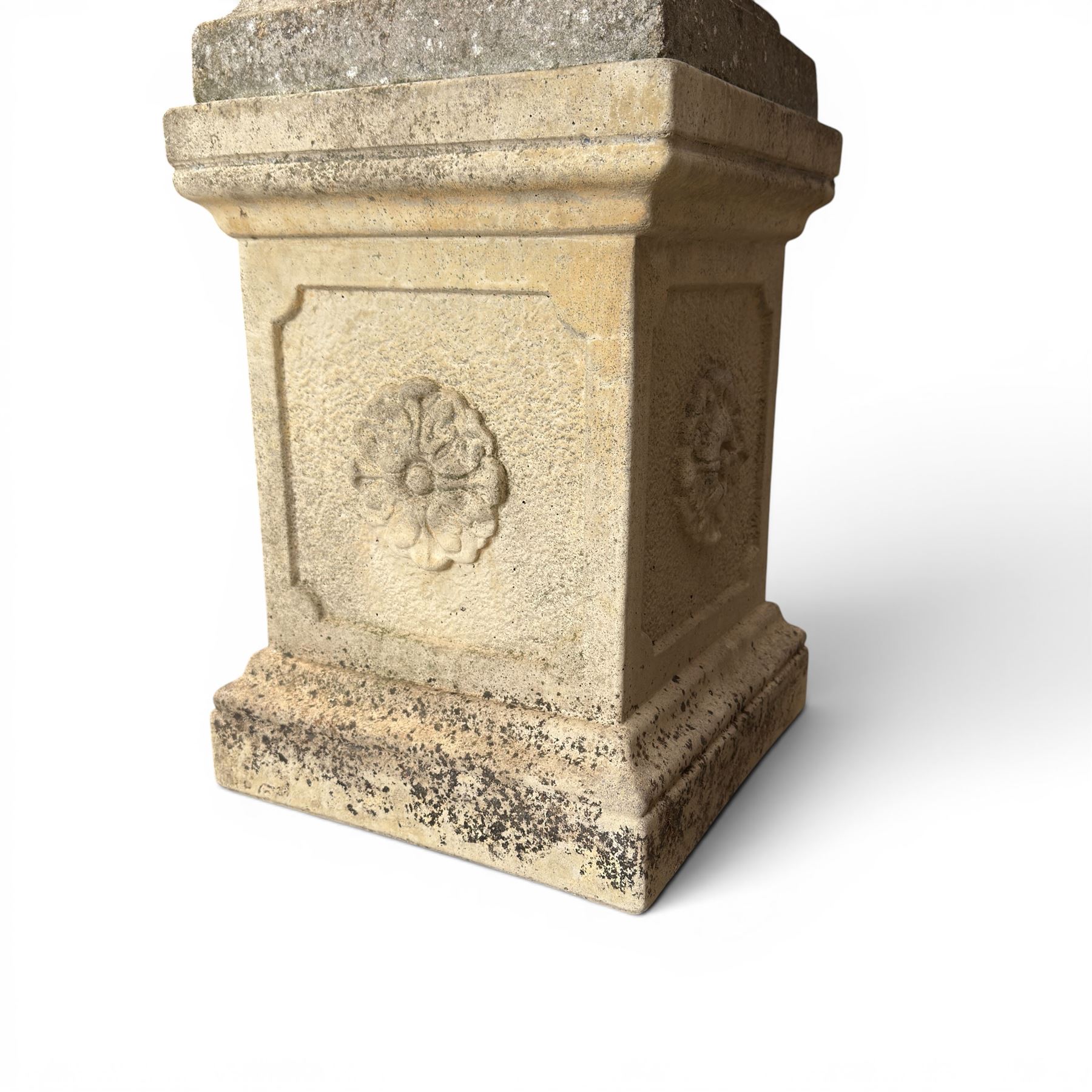 Weathered cast stone statue of a child and urn planter on pedestal along with three piece bird bath
