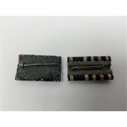 Collection of eleven German metal and cloth badges and uniform buttons including driver's badge, two 'SS' fabric skulls, private's shoulder tabs, Police cloth badge, tank destruction badge, medal bars and ribbon etc; most WW2 period