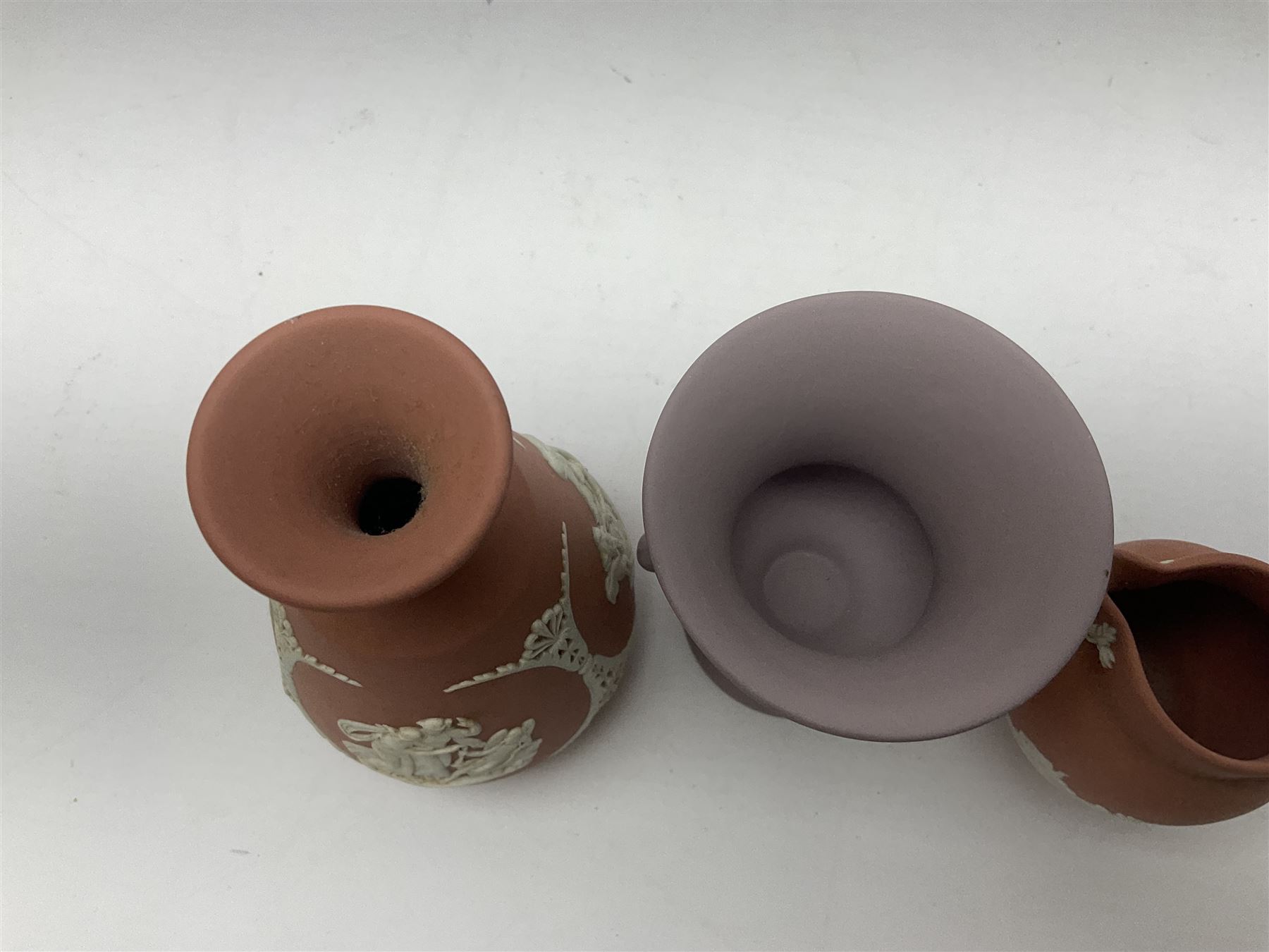 Collection of Wedgwood Jasperware, in orange, lilac and pink colourways, including oval tray, small jug, trinket boxes, trinket dishes, etc , all with impressed mark beneath