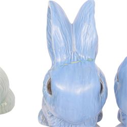 Nine Sylvac rabbits, including models 1028, 990, 1026 etc, in blue and green, largest H25cm  
