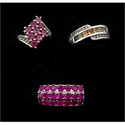 Three silver stone set rings including rainbow sapphire and white zircon crossover, umbalite and white topaz and and a ruby three row ring, all stamped 925 and a tourmaline bead string necklace