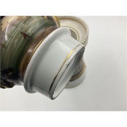 Two 19th century continental teapots and warmers, each teapot upon a cylindrical warming base, hand printed with seascapes, largest H22cm 