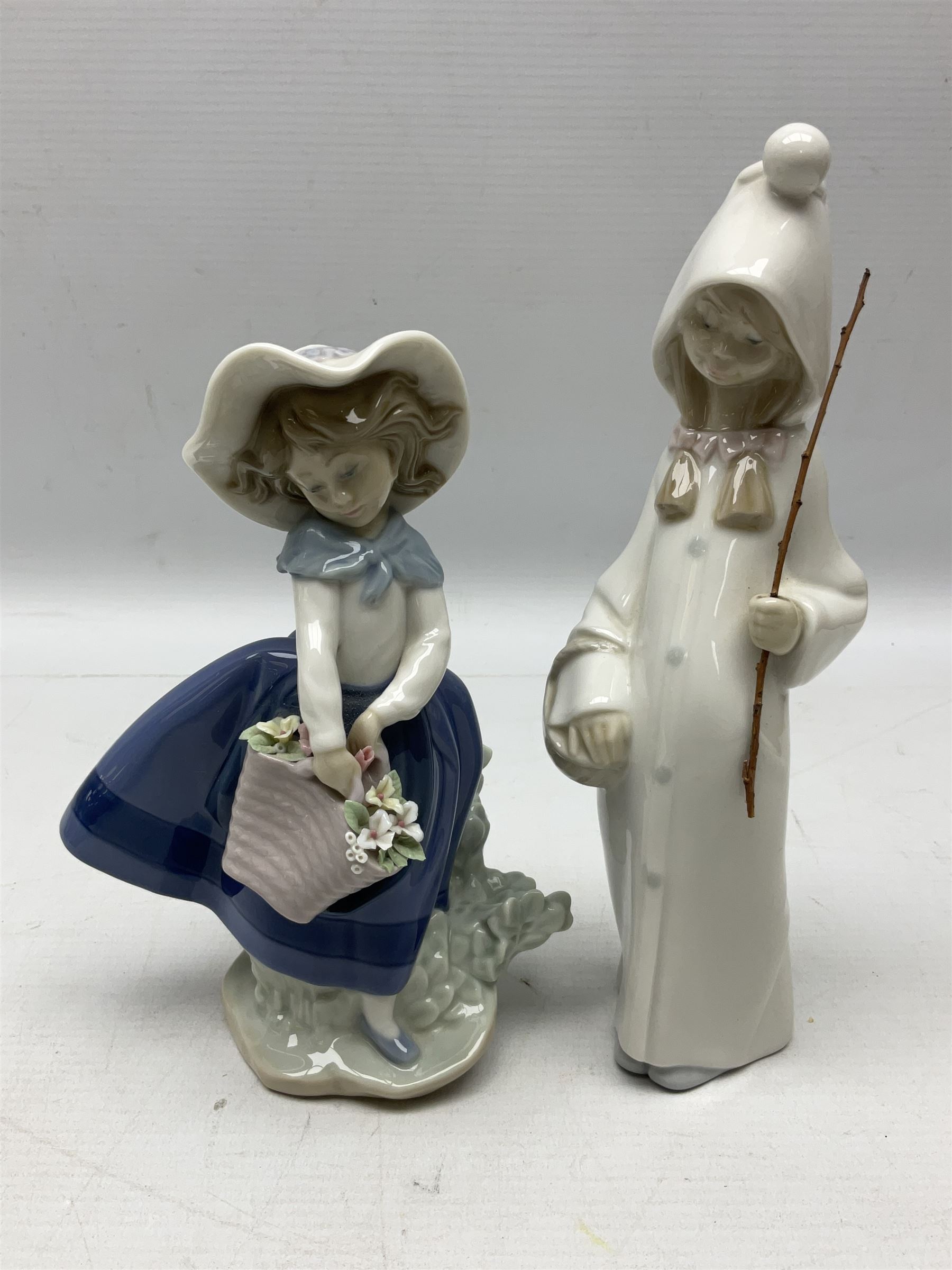 Four Lladro figures, comprising Pulling Dolls Carriage no 5044, Belinda with her Doll no 5045, Pretty Pickings no 5222 and Shepherdess with basket no 4678 