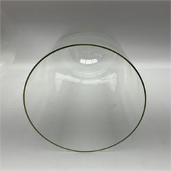 Tabletop glass display cabinet, with hinged door, together with two glass domes