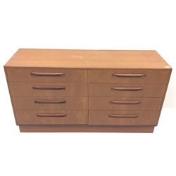  G-Plan teak chest, eight graduating drawers, plinth base (W142cm, H76cm, D45cm) and matching floating top dressing table, raised mirror back, one slide and four drawers, tapering supports (W153cm, H121cm, D50cm) (2)  